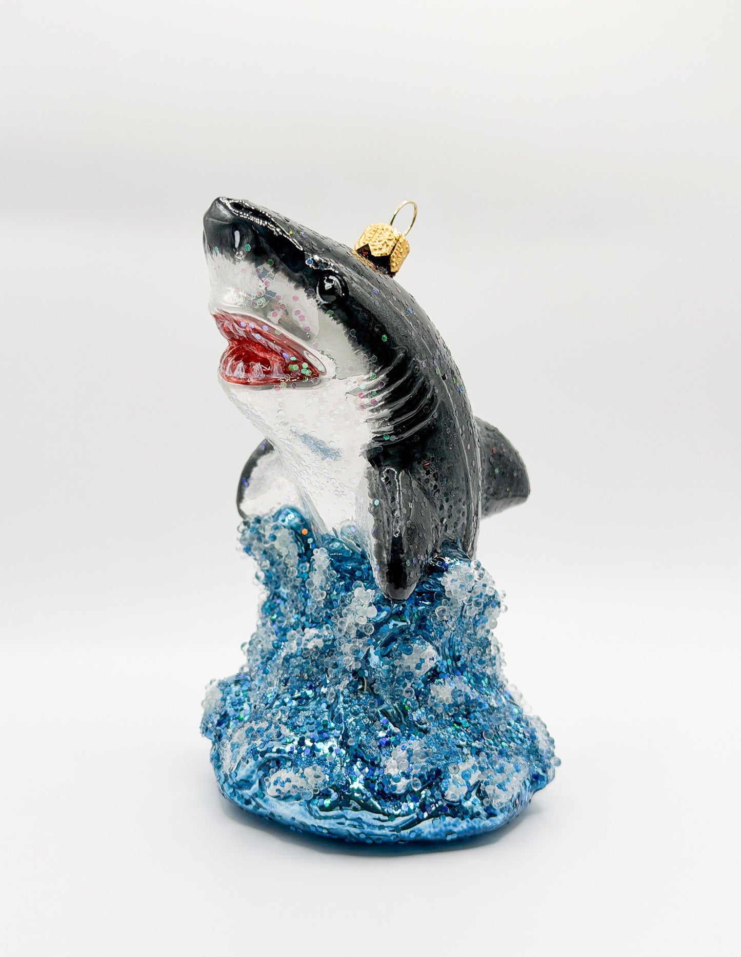 Great white shark leaps from the waves