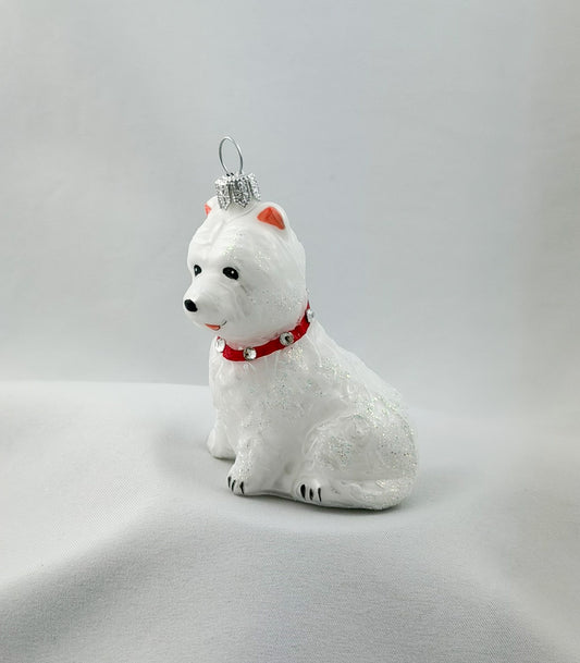 West Highland Terrier dog with red glitter collar
