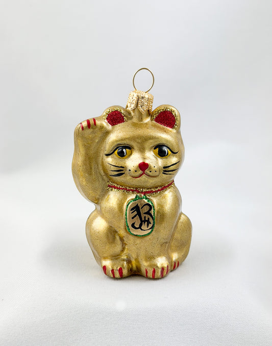 Small golden Maneki-Neko, Asian lucky cat