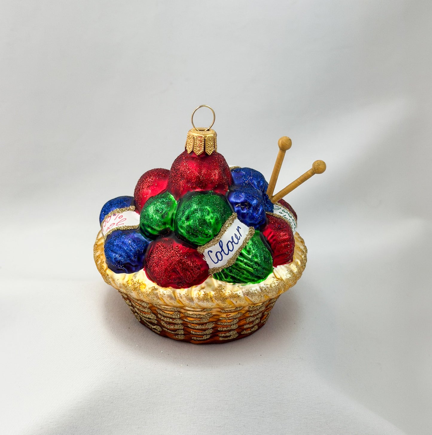 Knitted basket with many balls of wool