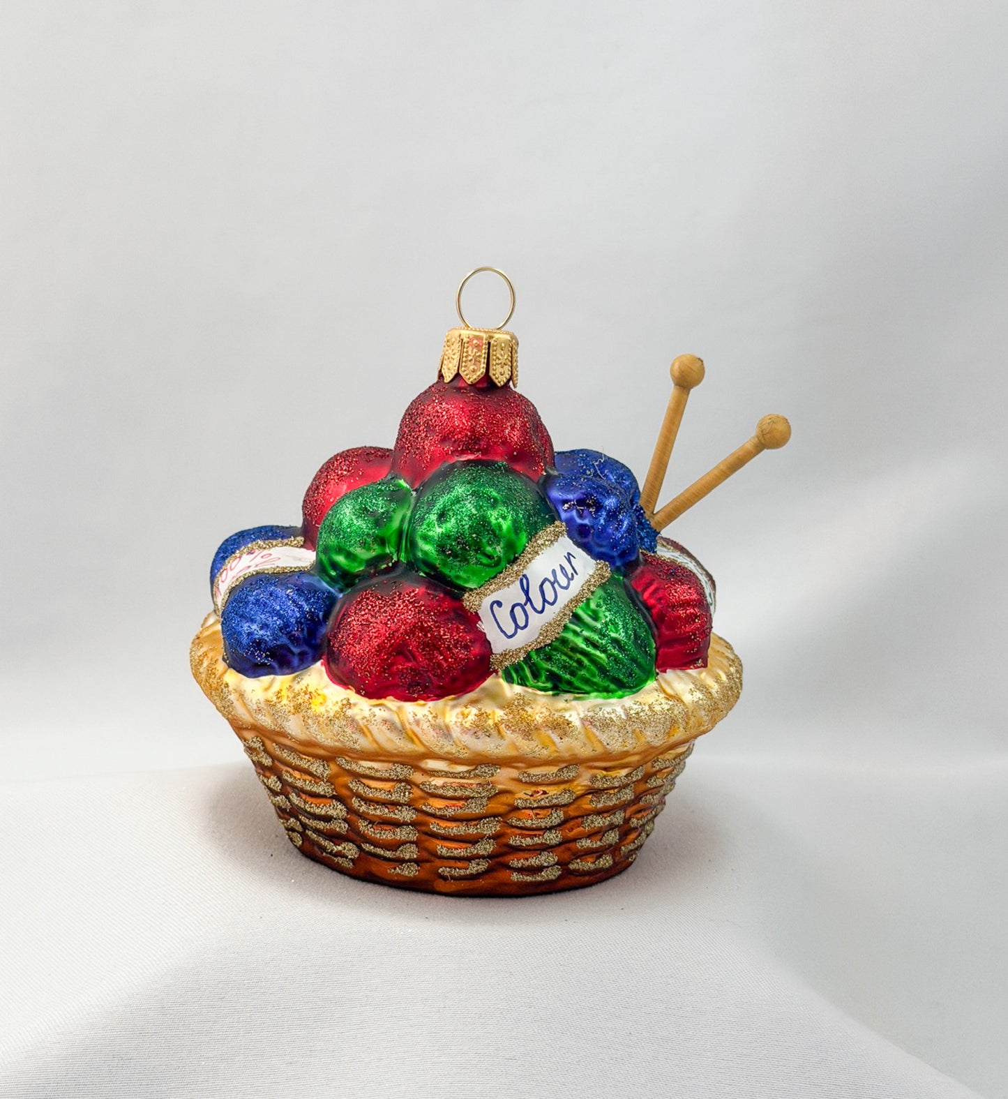 Knitted basket with many balls of wool