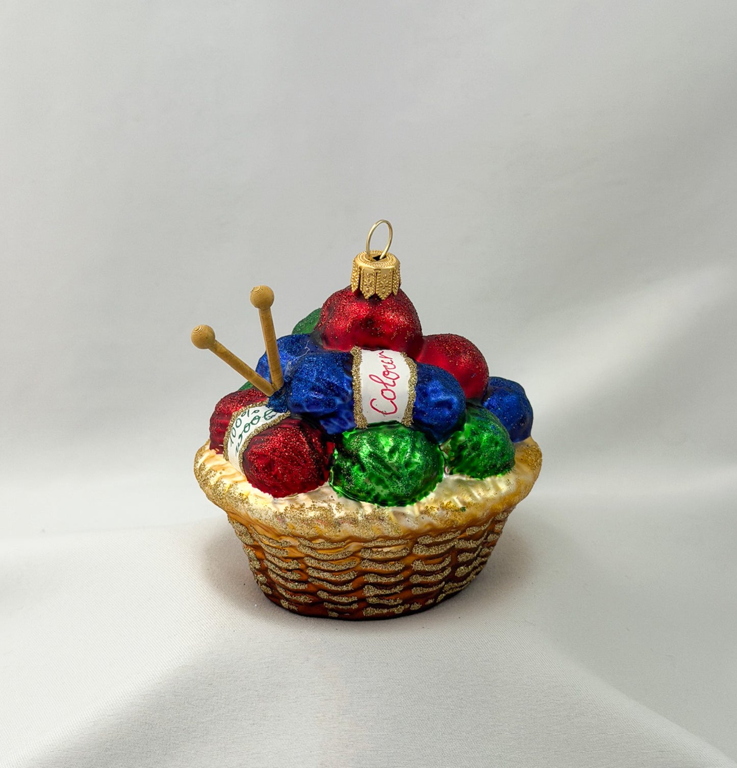 Knitted basket with many balls of wool