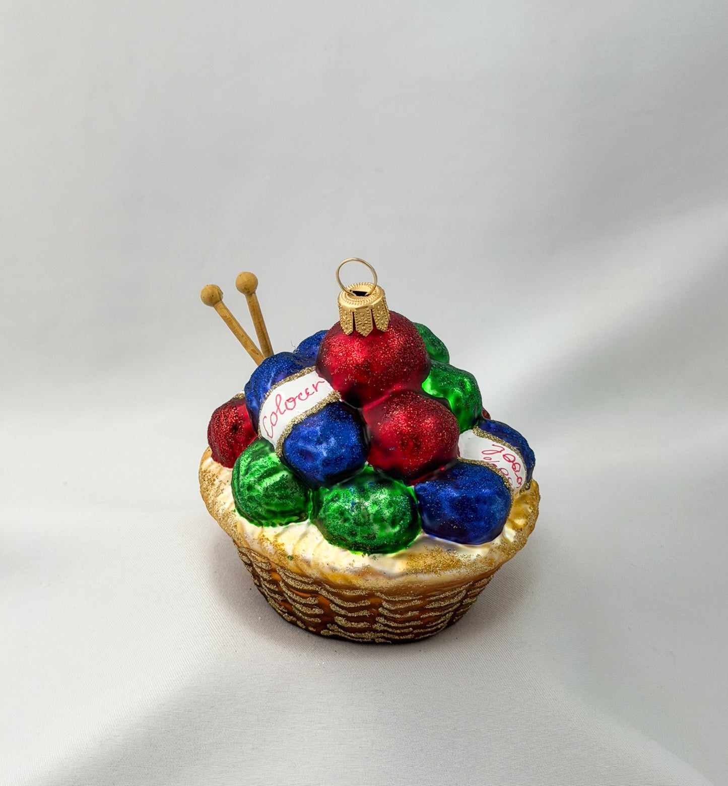 Knitted basket with many balls of wool