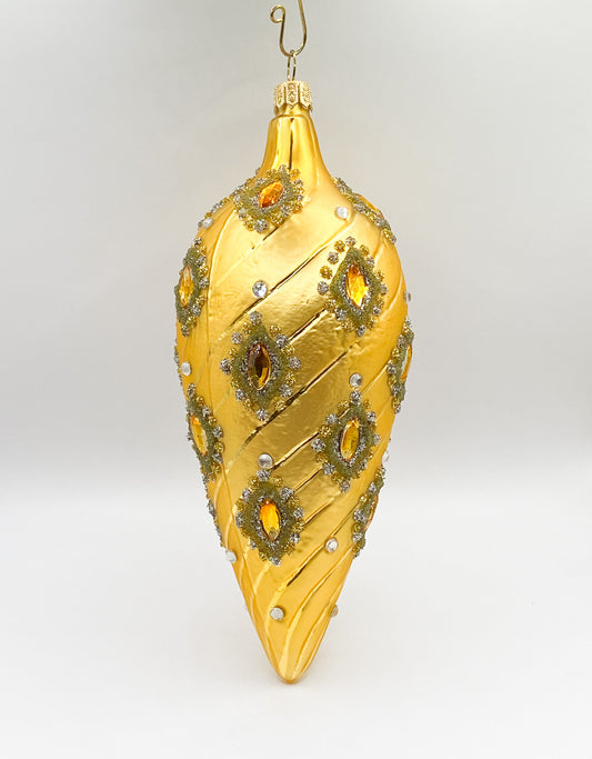 Golden baroque cone with golden gemstones