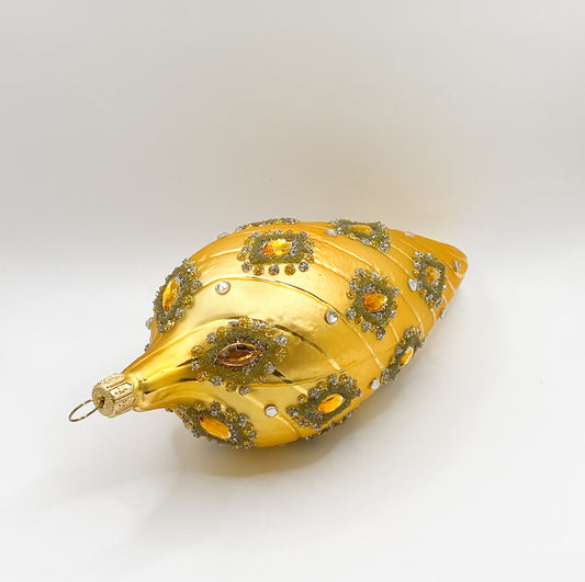 Golden baroque cone with golden gemstones