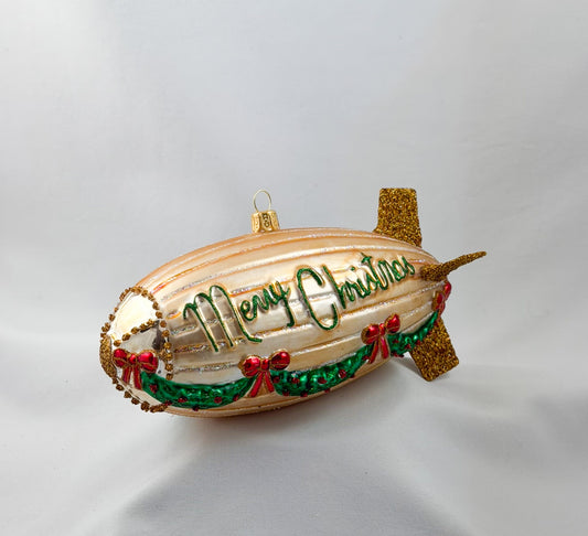 Large golden Zeppelin, festively decorated for Christmas