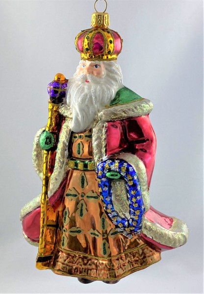 Nikolaus in braunem Gewand und goldenem Stab mit violetter Kugel