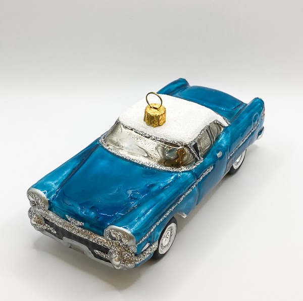 Blauer Vintage Cadillac mit weissem Dach