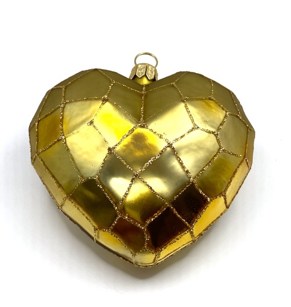 Goldenes Herz mit geometrischem Muster