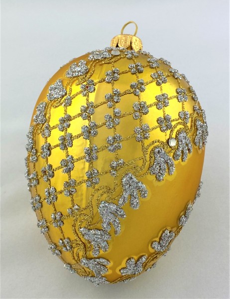 Goldenes Faberge-Ei mit silbernem Barock-Muster