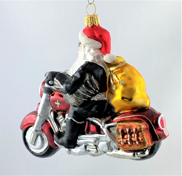 Santa bringt die Geschenke mit dem coolen Motorrad