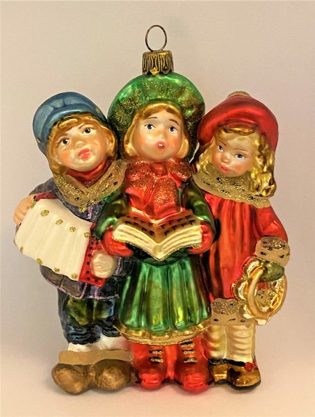 Drei Kinder singen zusammen Weihnachtslieder, KOMOZJA MOSTOWSKI