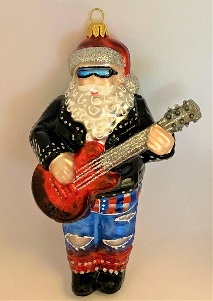 Santa Claus spielt die elektrische Gitarre