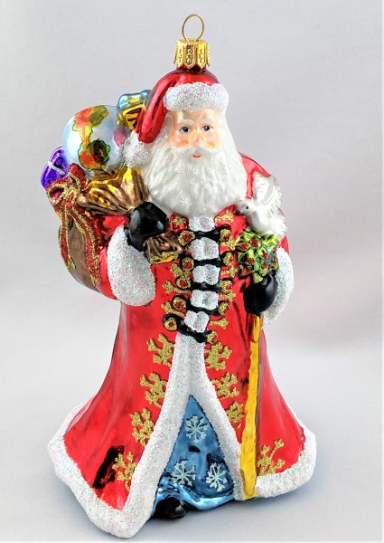 Weihnachtsmann mit Friedenstaube auf dem Arm