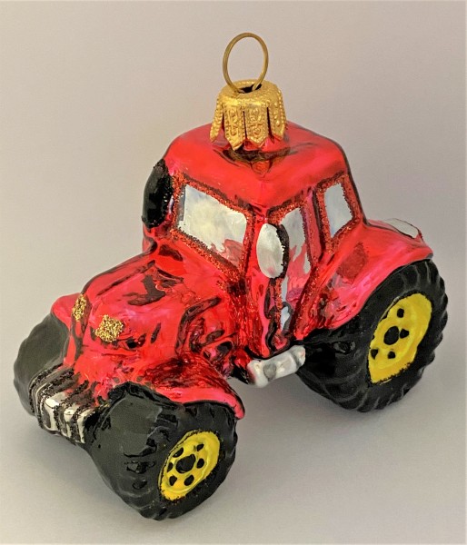 Roter Traktor mit gelben Rädern