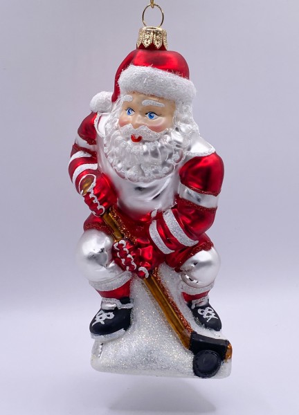 Santa spielt Eis-Hockey