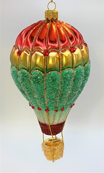 Bunter Heissluftballon mit goldenem Korb