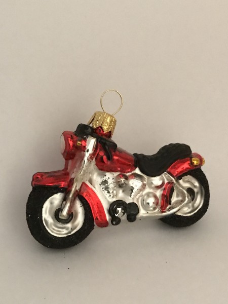 Kleines rotes Motorrad