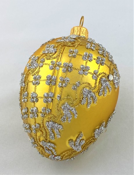 Goldenes Faberge-Ei mit silbernem Barock-Muster