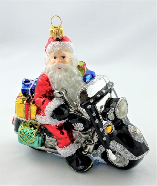 Santa ist mit dem schweren Motorrad unterwegs