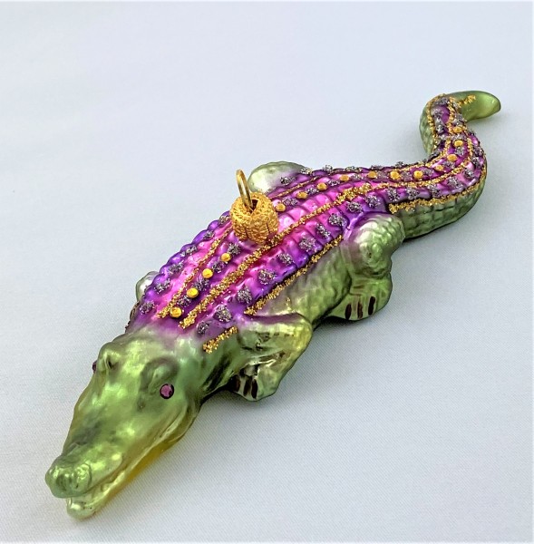 Krokodil, grün mit violettem Rücken