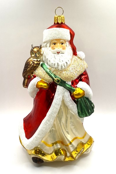 Weihnachtsmann mit Uhu auf der Schulter