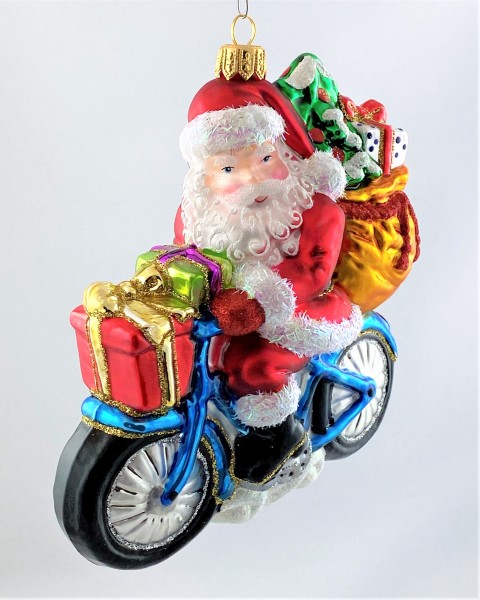 Santa ist mit dem Fahrrad unterwegs