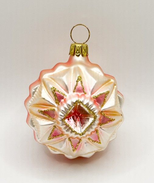 Medaillon mit stilisiertem rosa Stern