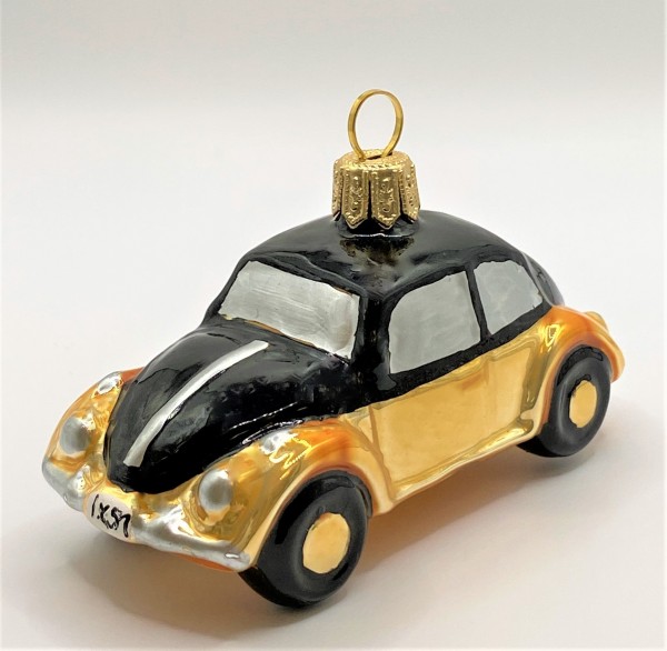VW-Käfer gold mit schwarzem Dach