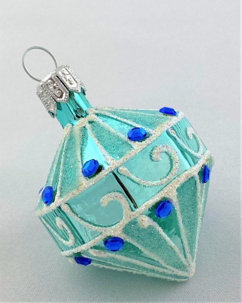Türkisfarbenes Kreisel-Ornament mit blauen Schmucksteinen