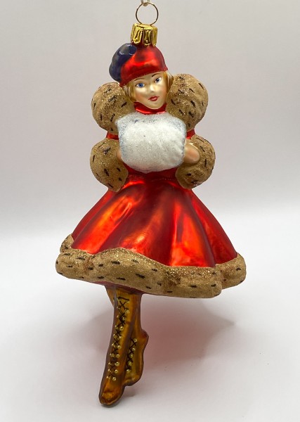 Frau im roten Winterkleid mit weissem Muff, KOMOZJA MOSTOWSKI